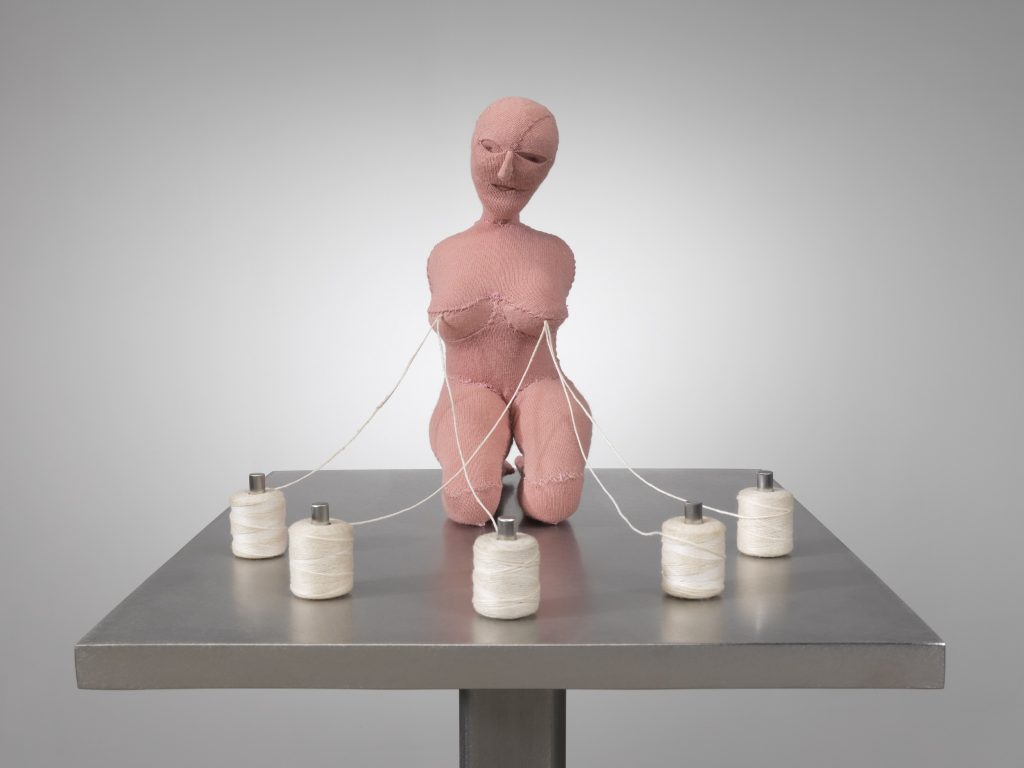 Louise Bourgeois The Good Mother (detail), 2003. Fabric, thread, stainless steel, wood and glass. 109.2 x 45.7 x 38.1 cm. © The Easton Foundation/VAGA at ARS, NY and DACS, London 2021. Photo: Christopher Burke